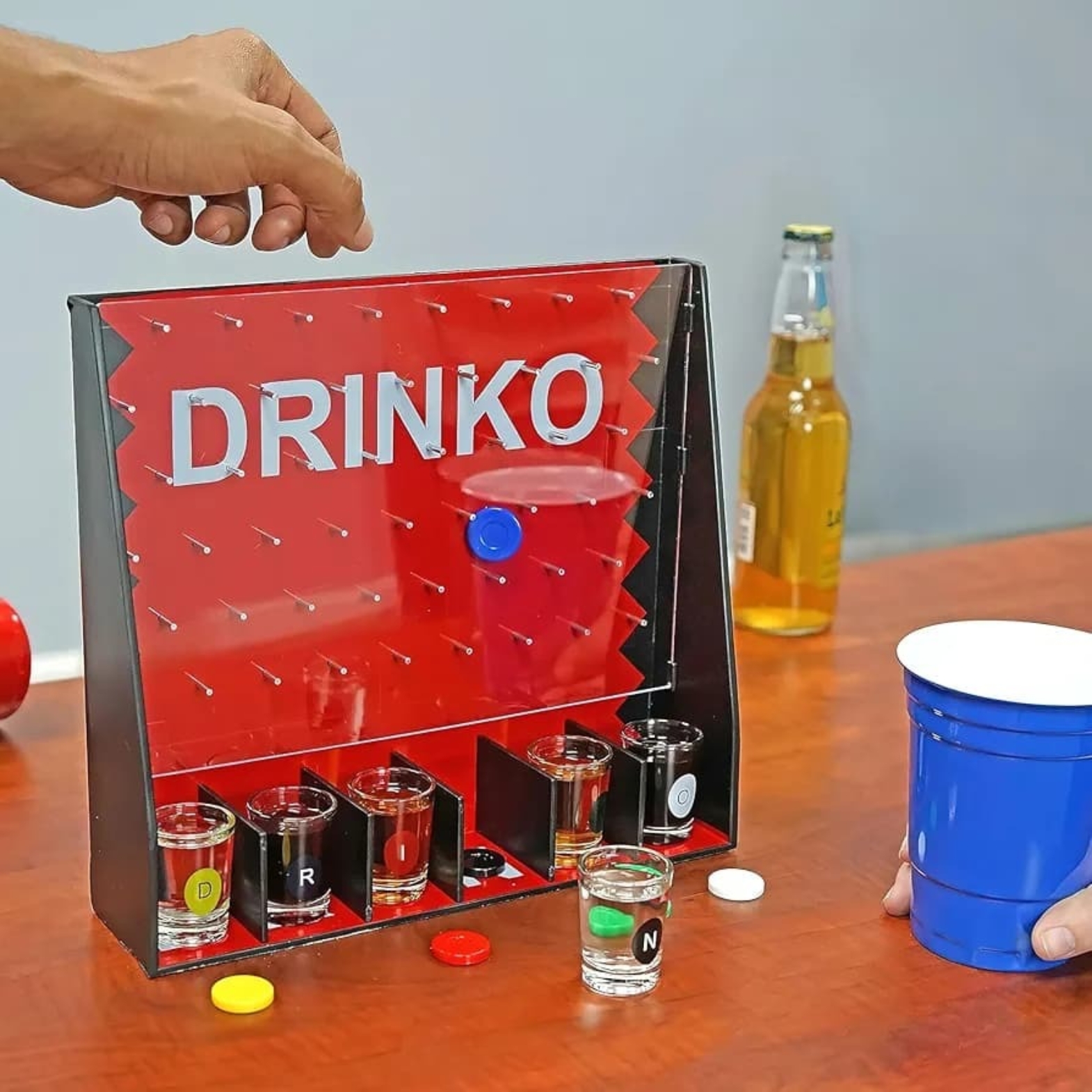 A complete Drinko Shot Game set including the pegboard and coloured shot glasses from Boards Games & Cards.