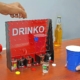 A complete Drinko Shot Game set including the pegboard and coloured shot glasses from Boards Games & Cards.